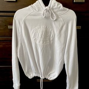 Bench hoodie with adjustable waist, can be cinched into a crop.